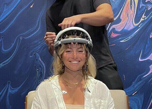 Woman getting a qEEG as part of her EEG-guided rTMS treatment for cognitive performance and mental health